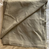 Almond-colored Caravan bedspread