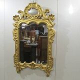 Miroir ancien en bois doré
