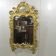 Antique mirror in gilded wood