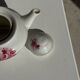 Complete porcelain teapot and warmer with pink floral decoration H18
