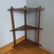 Hanging corner wall shelf