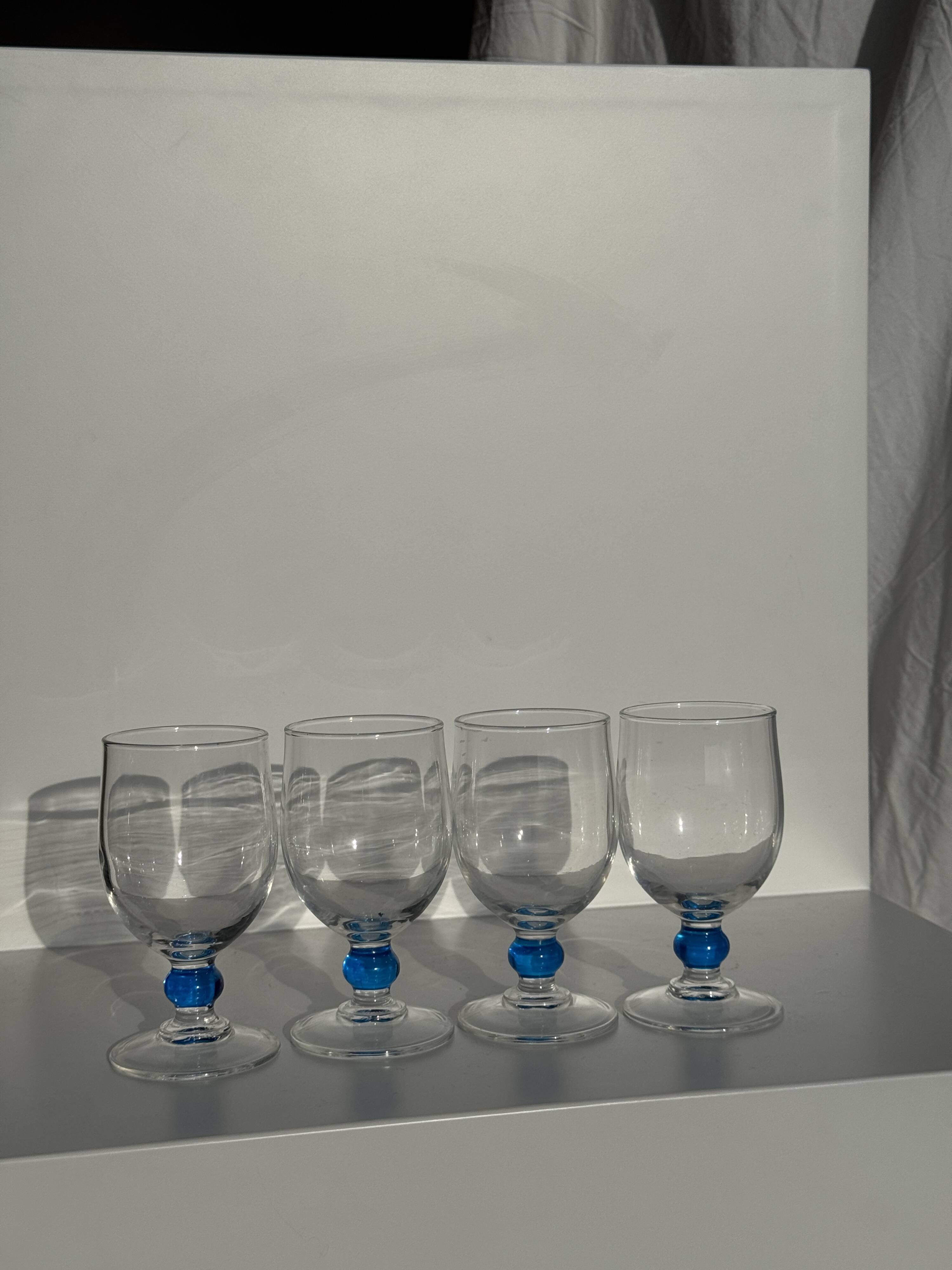 Set of 4 blue ball stemmed water glasses