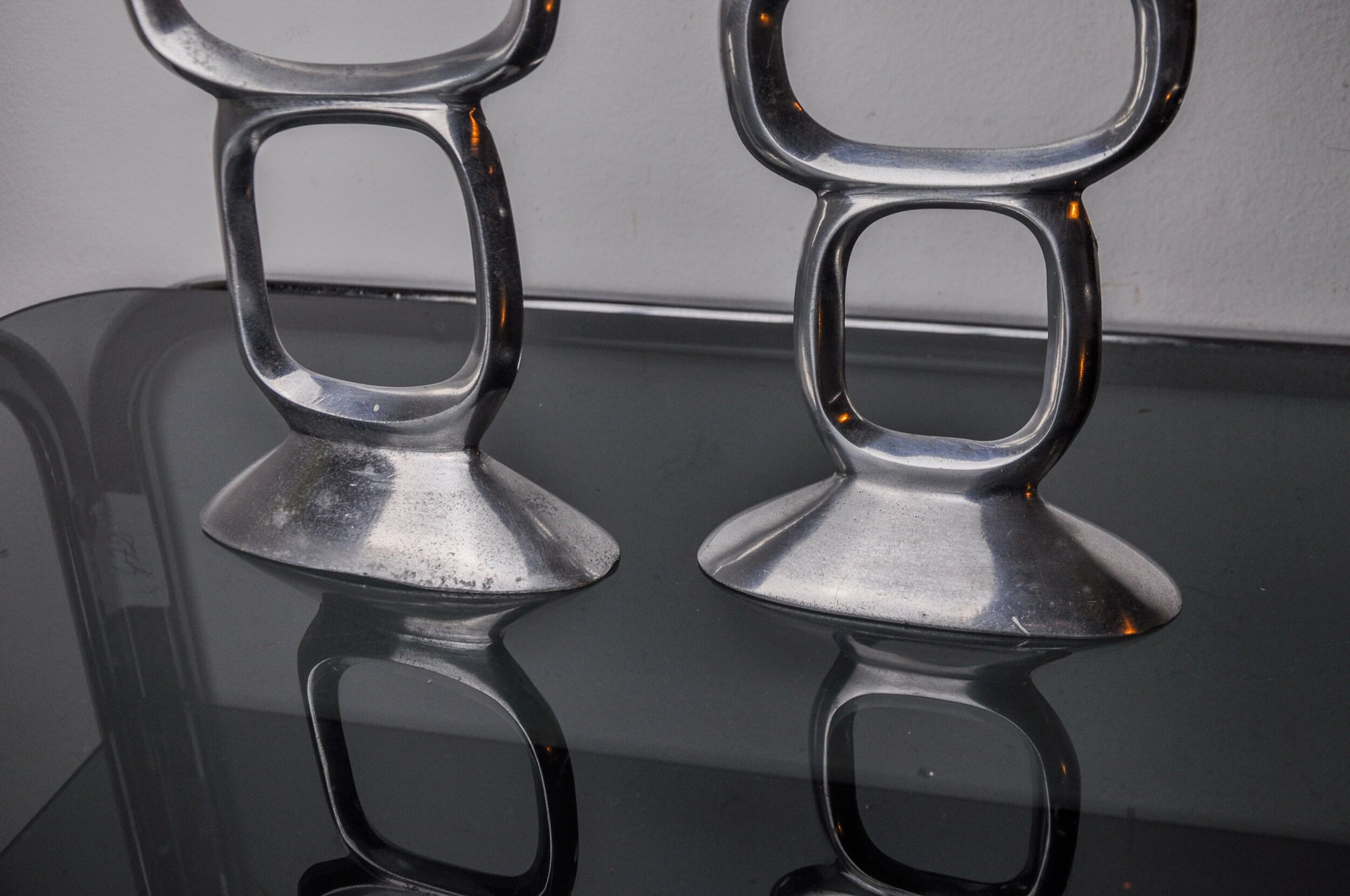 Pair of circle candlesticks by Matthew Hilton, England, 1980