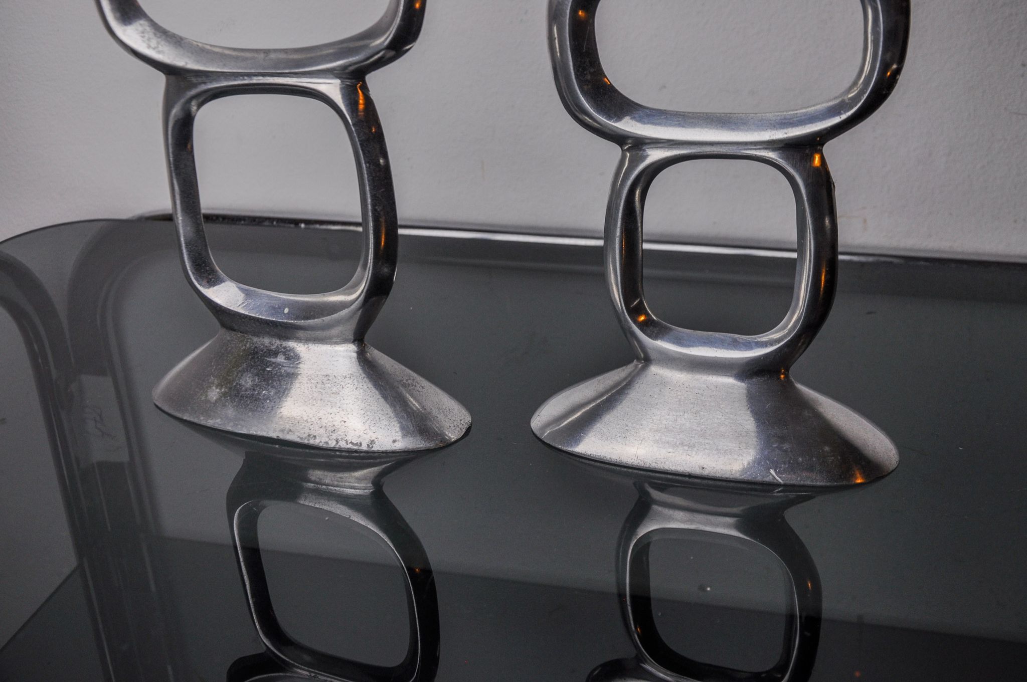 Pair of circle candlesticks by Matthew Hilton, England, 1980