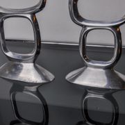 Pair of circle candlesticks by Matthew Hilton, England, 1980