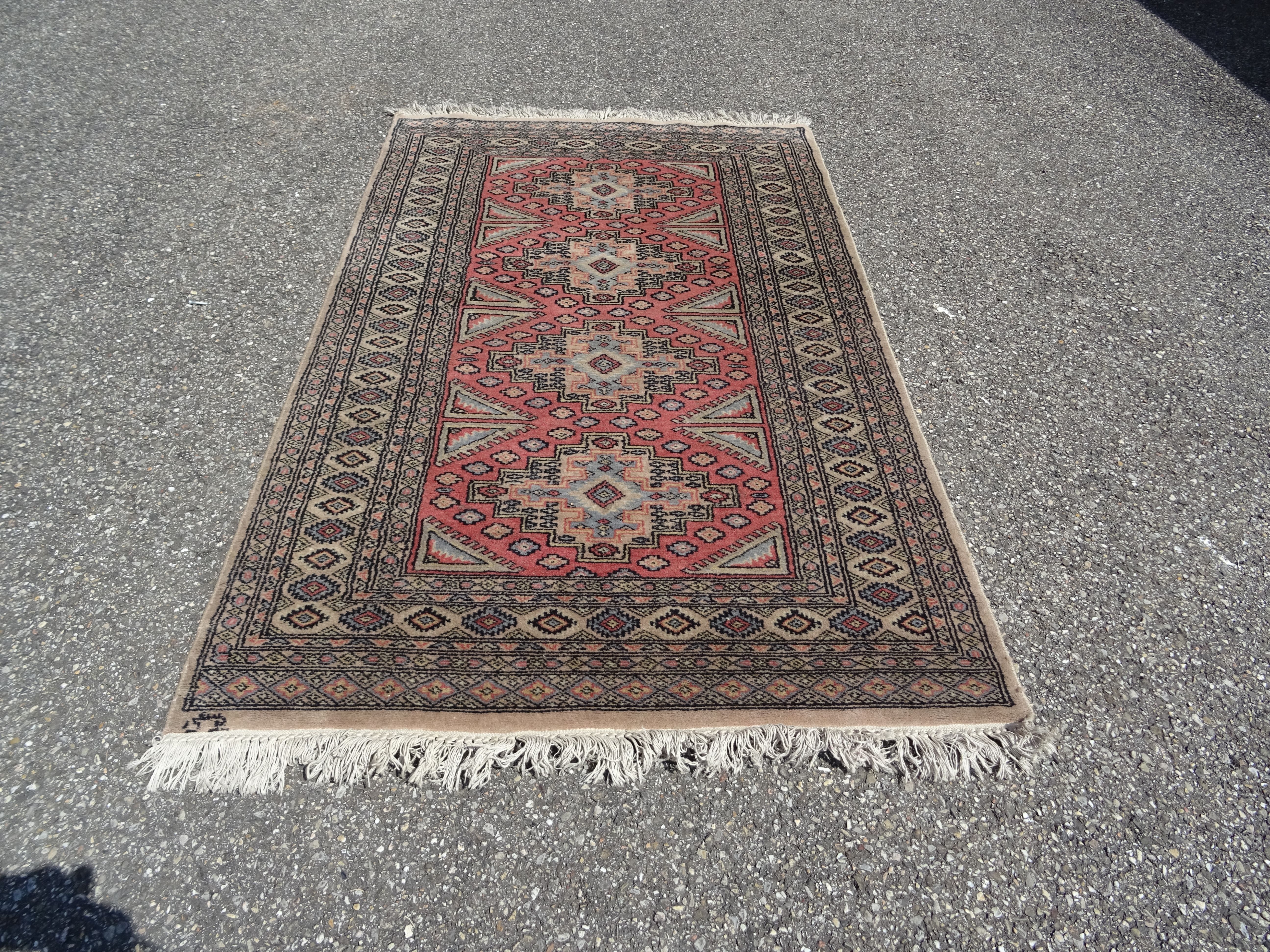 Pakistani carpet Bukhara handmade wool signed