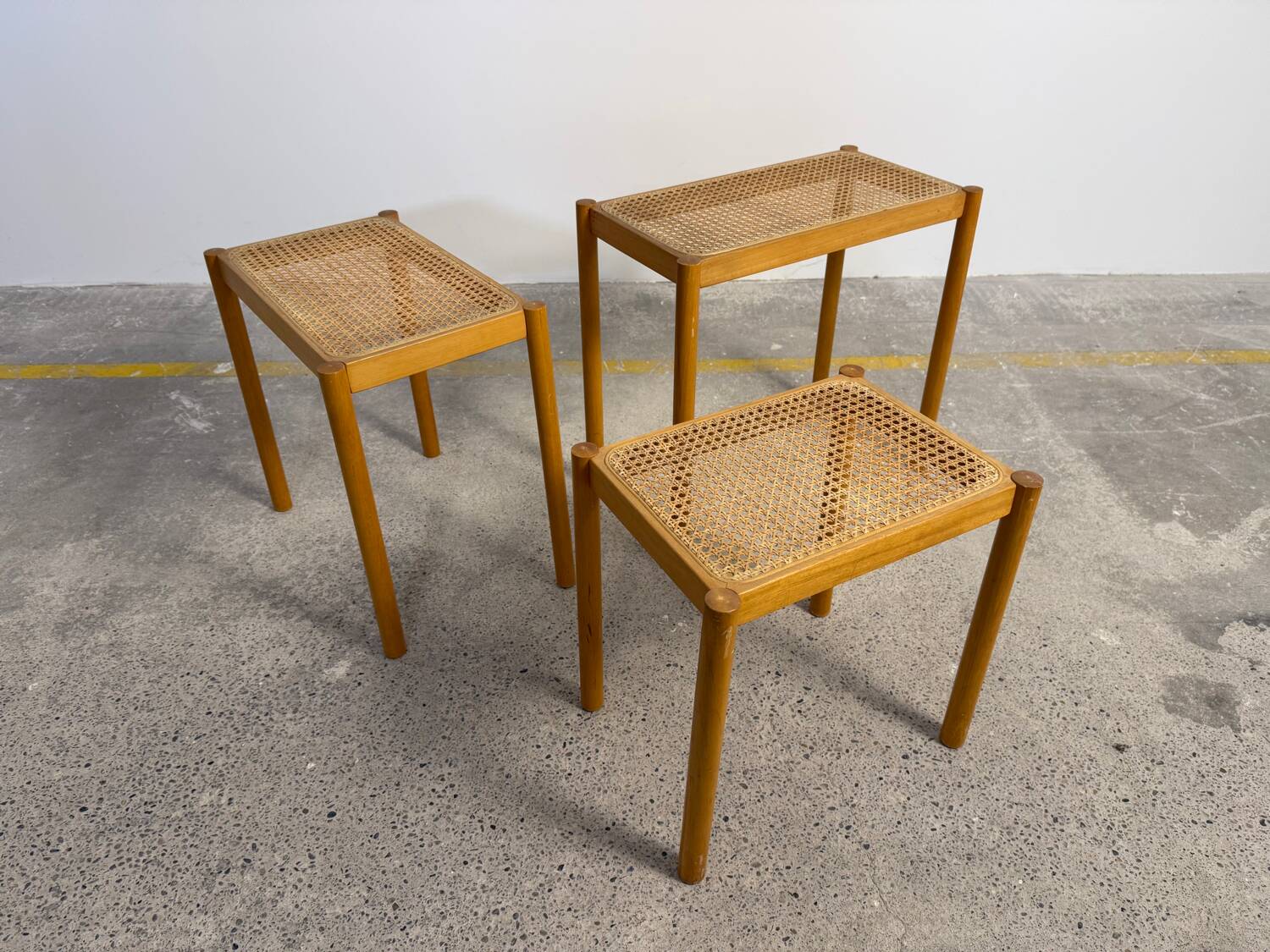 Set of Scandinavian nesting tables in wood and cane – 1960s