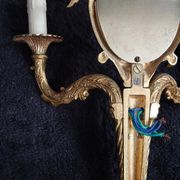 Pair of wall sconces with mirrors. Putti. Bronze. Floral Art Nouveau.