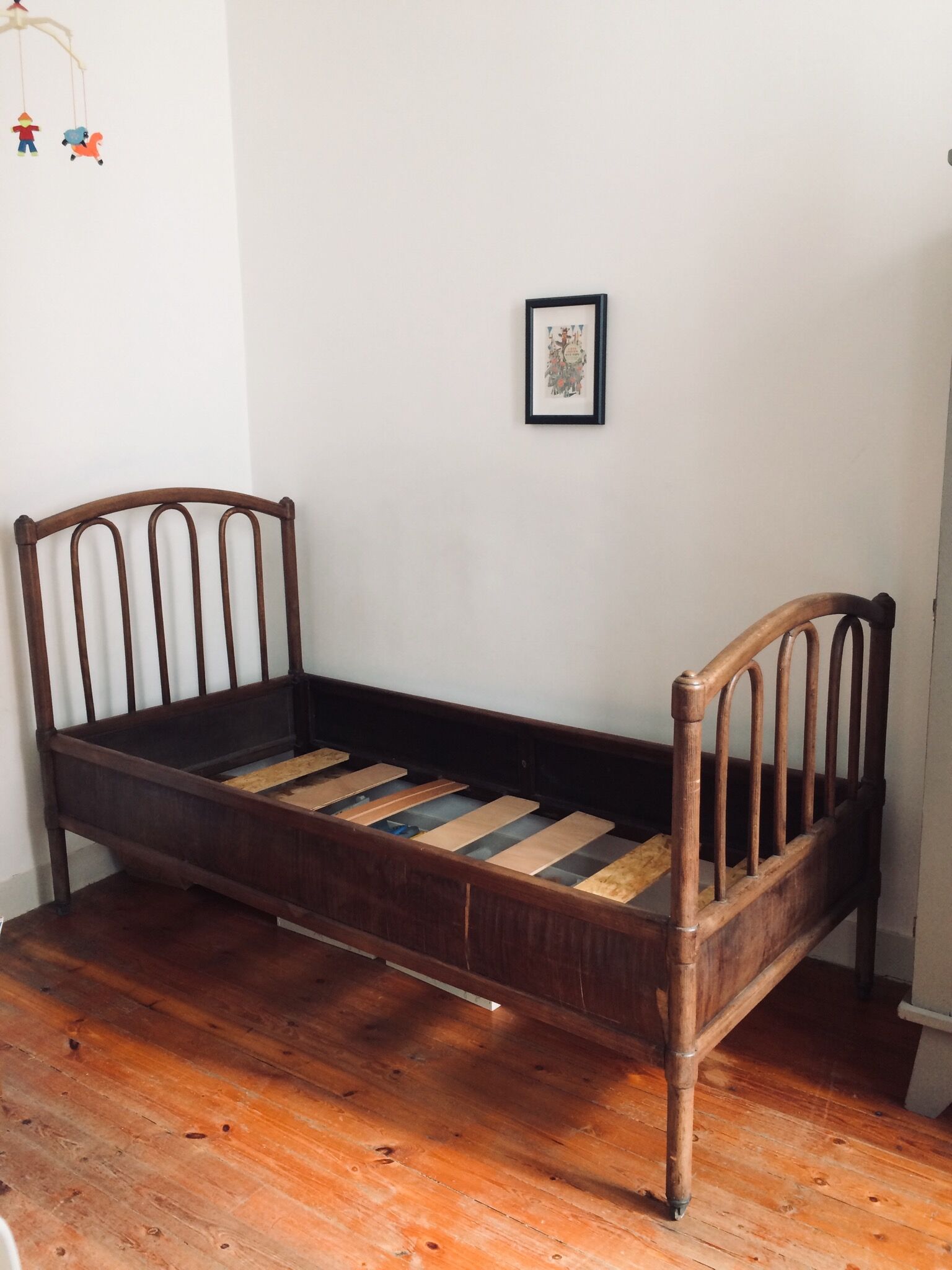 Old curved wooden bed - one person