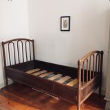 Old curved wooden bed - one person