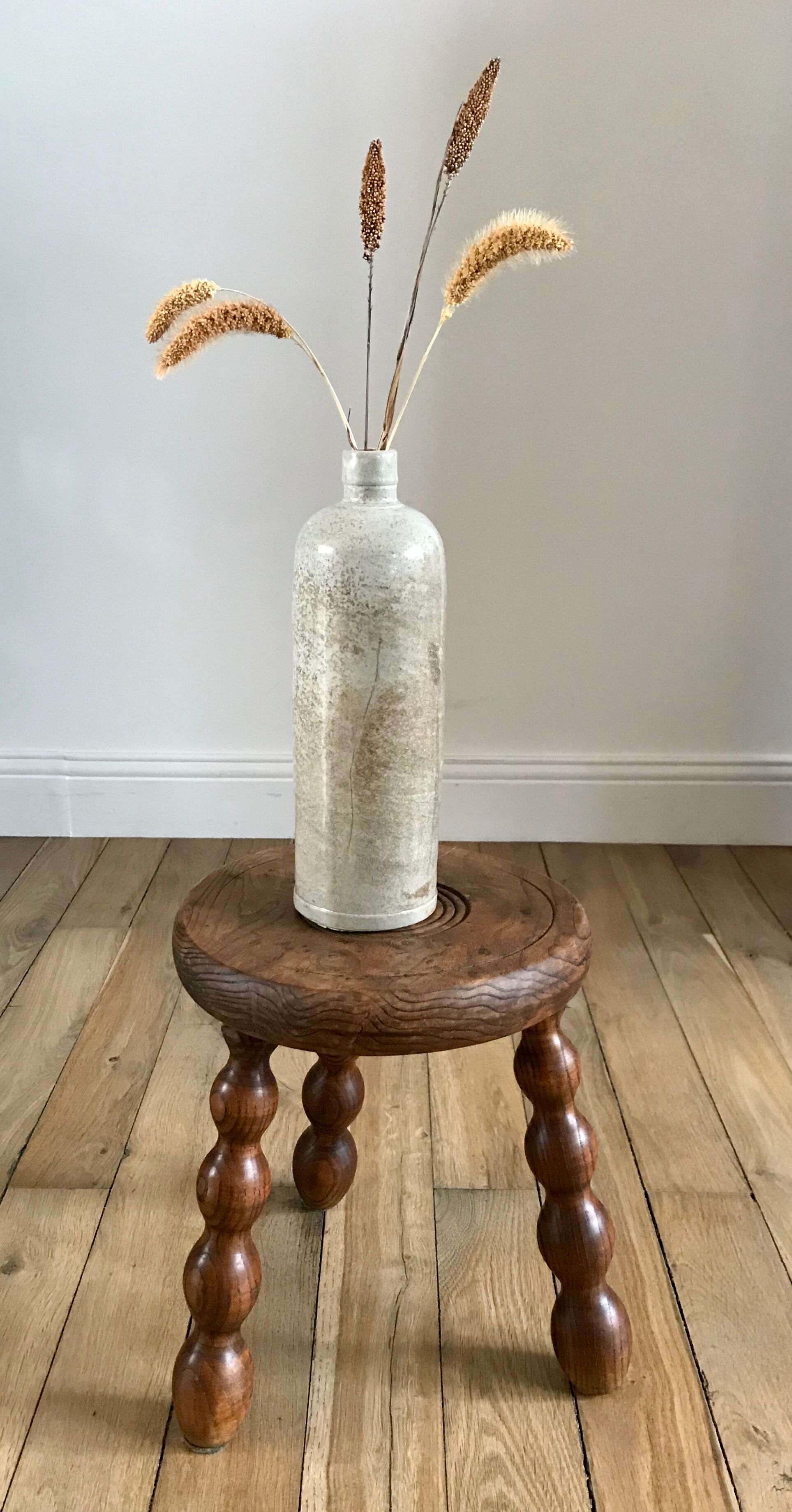 Low wooden stool turned solid 70s