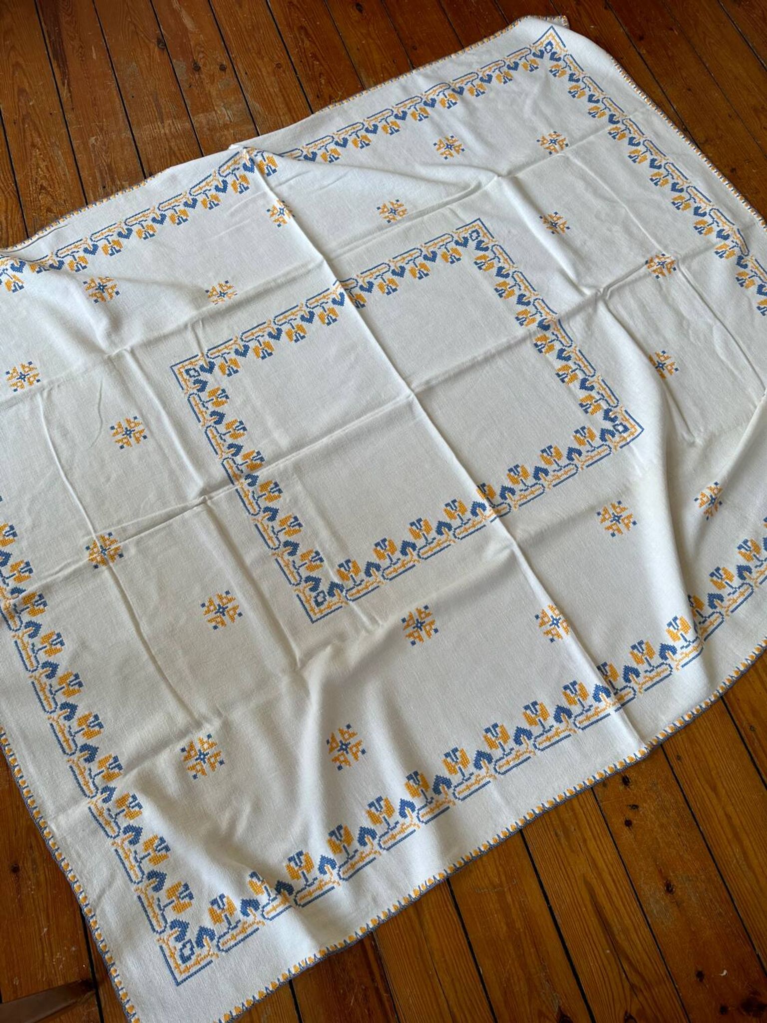 Embroidered white tablecloth