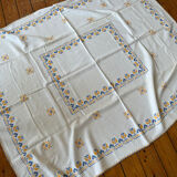Embroidered white tablecloth