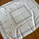 Embroidered white tablecloth