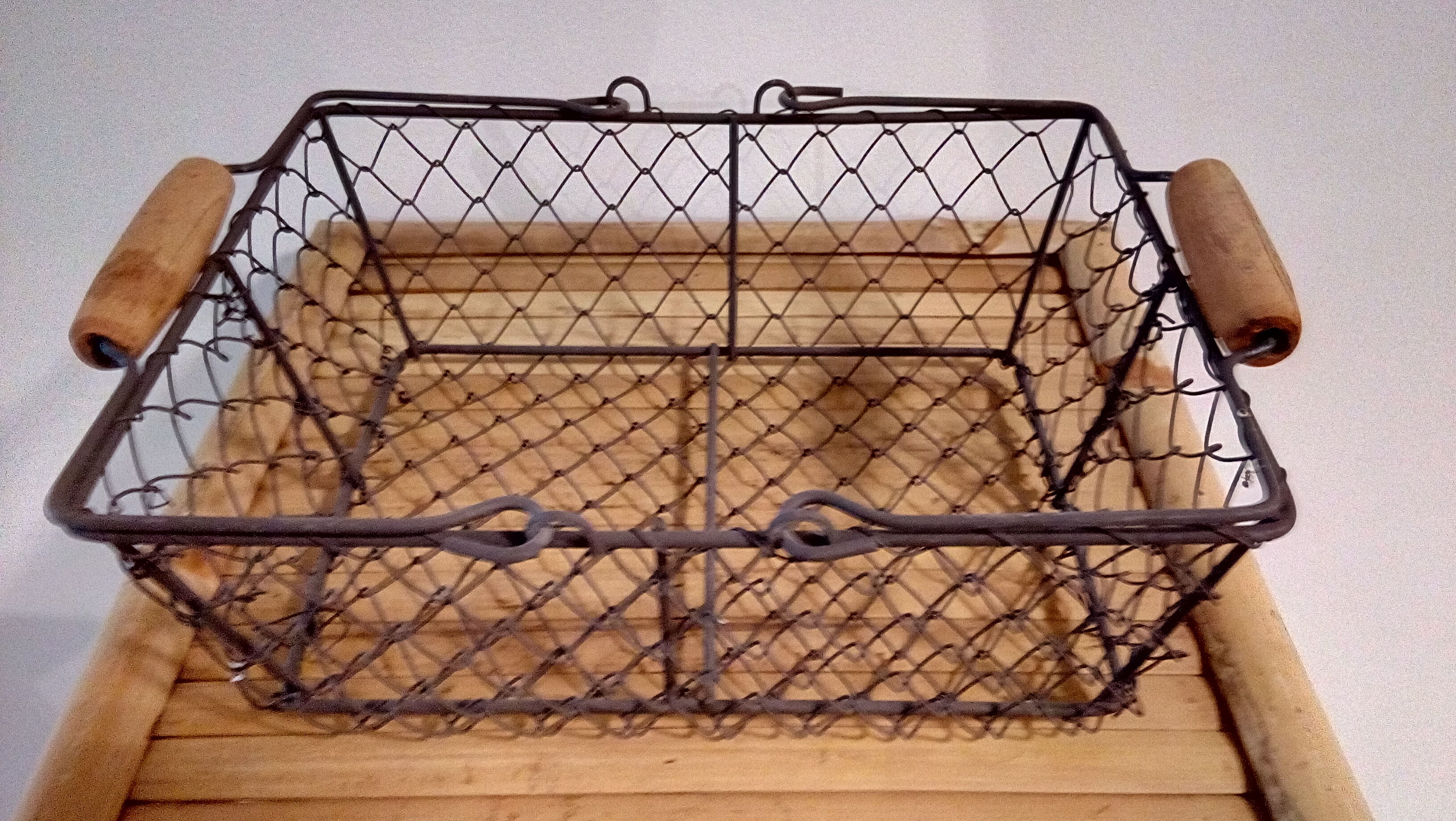 Duo of aged metal mesh baskets