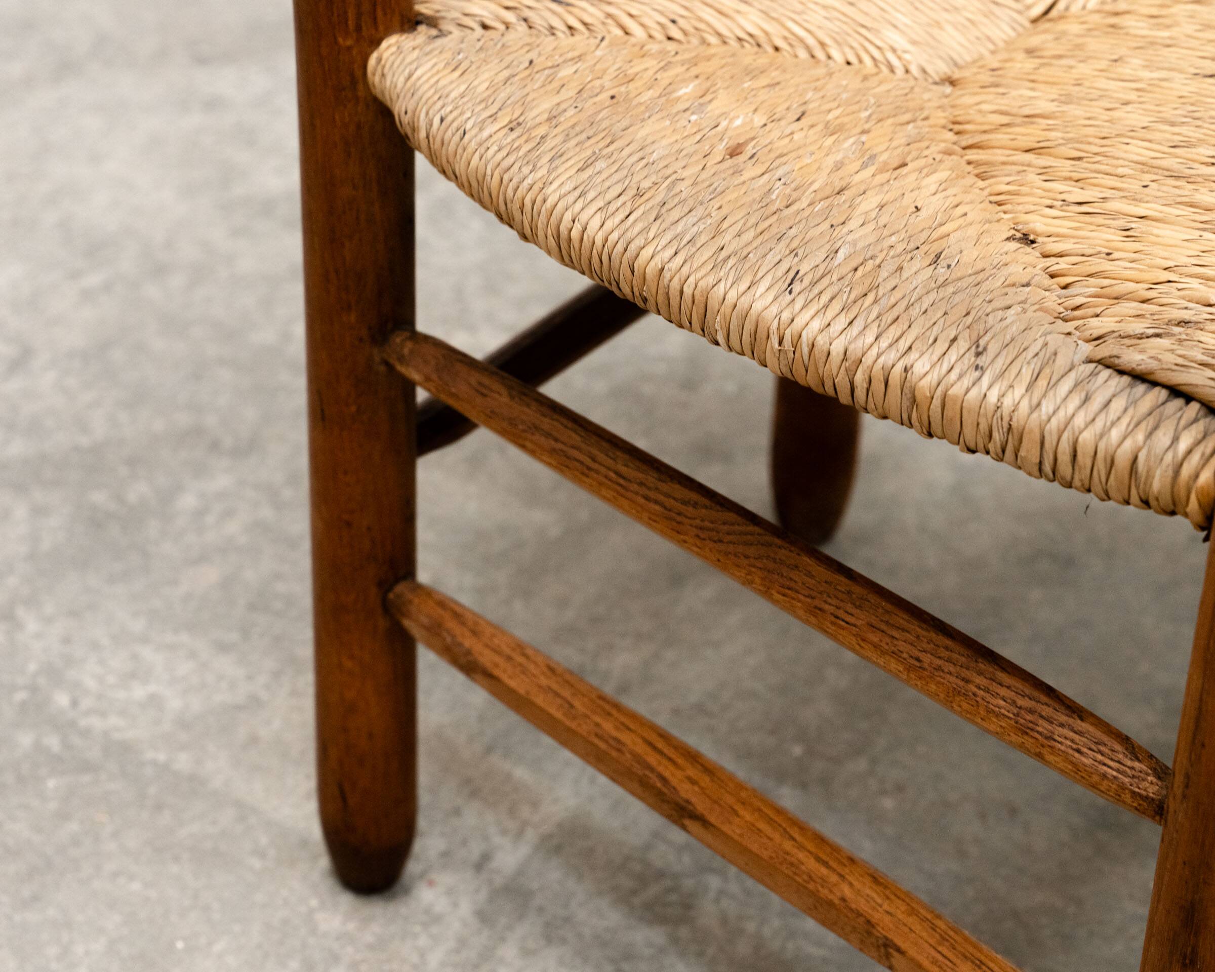 Fauteuil chêne et paille dans l’esprit de Charlotte Perriand 1950