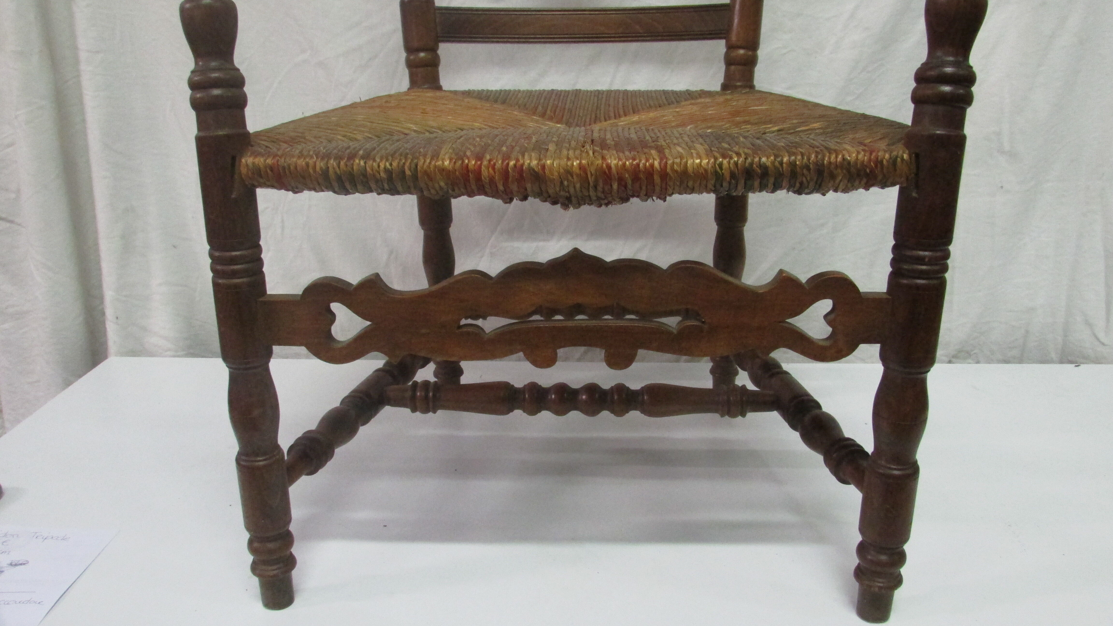 Antique armchair with armrests