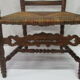 Antique armchair with armrests