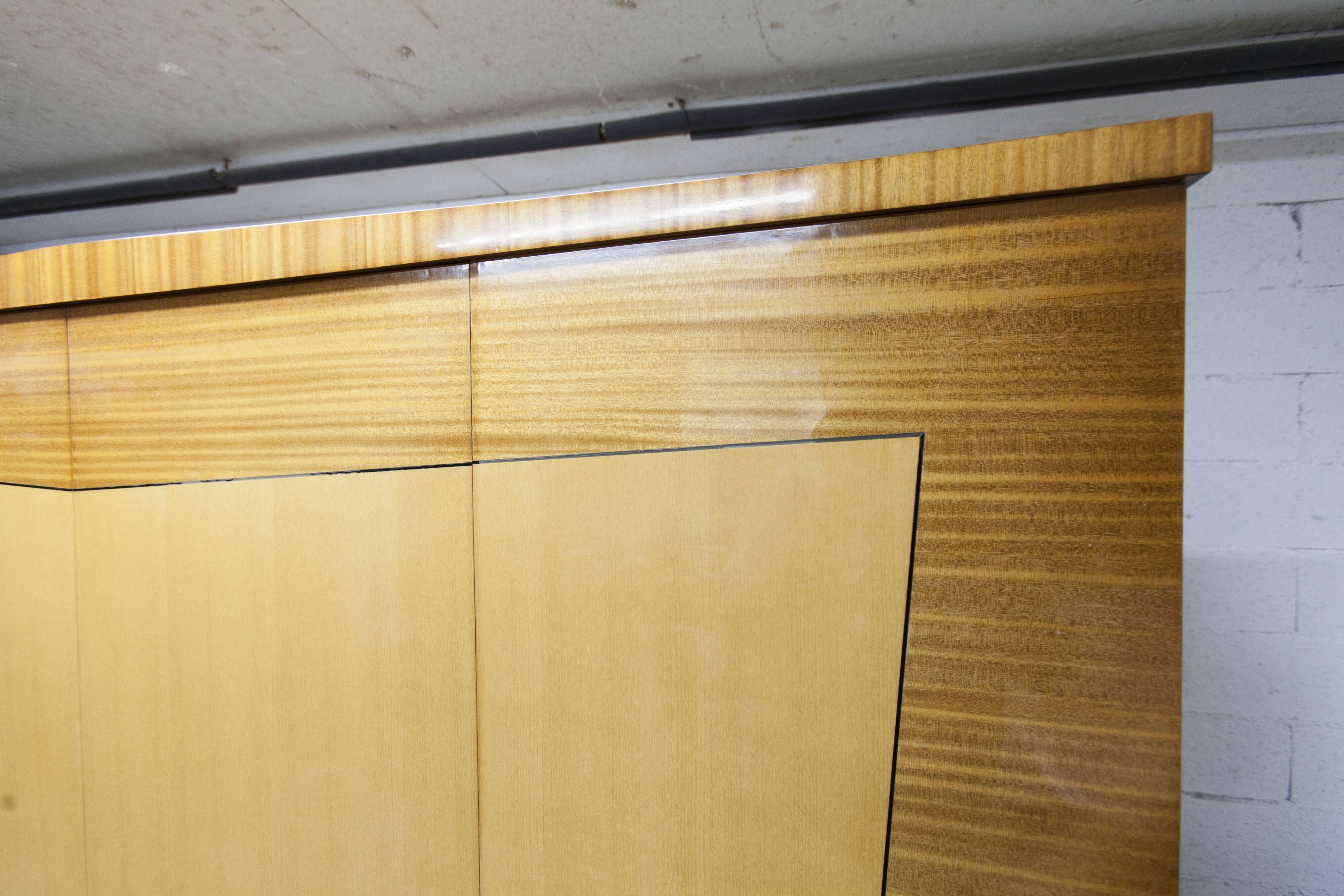 1960s Scandinavian wardrobe, blonde varnished wood, unusual, 4 doors, 3 drawers, 7 shelves.