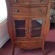 Small vestibule furniture from the Louis XVI period in cherry wood.