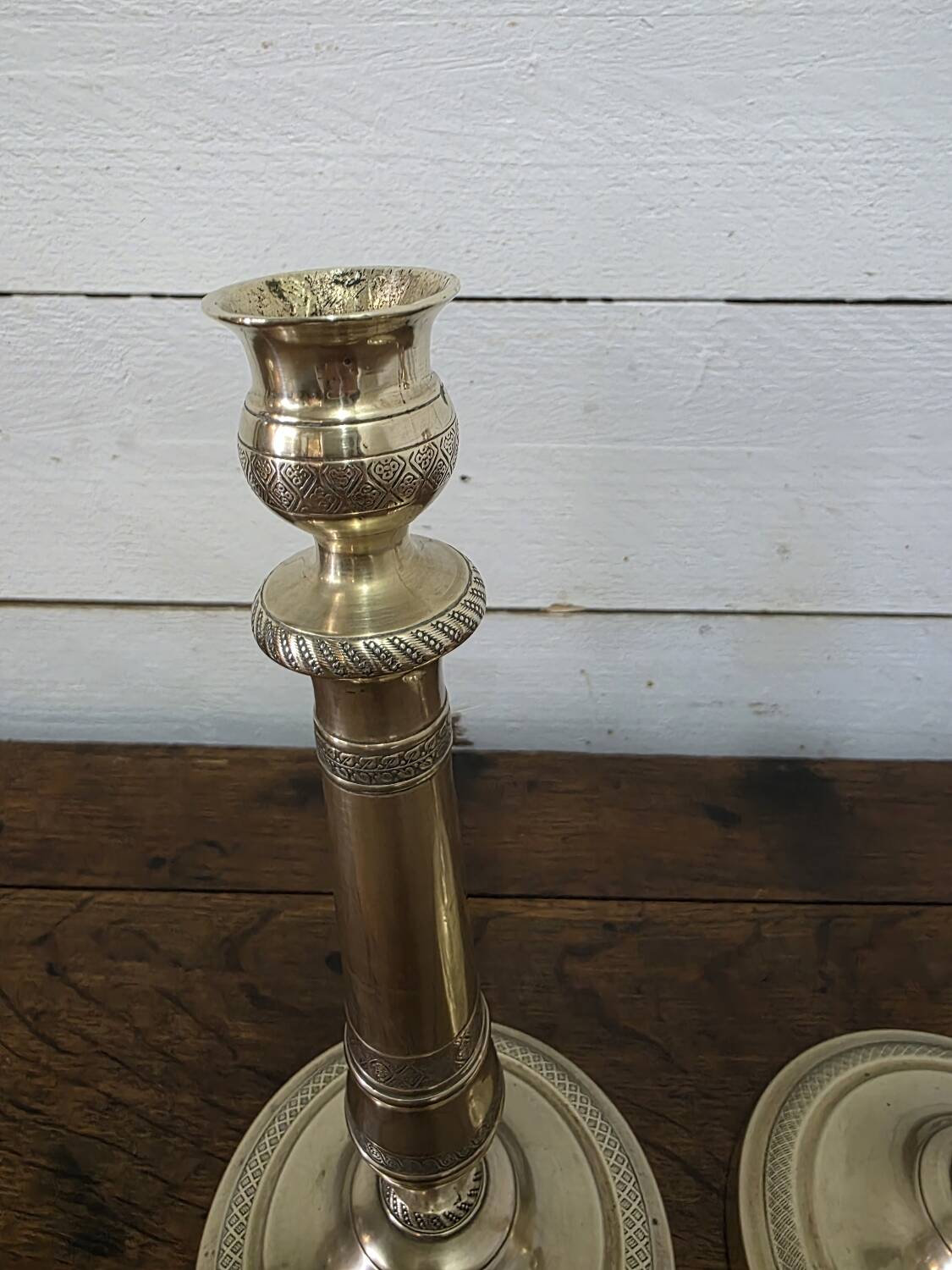 Antique pair of brass candlesticks