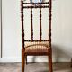 Turned wood and ochre velvet chair