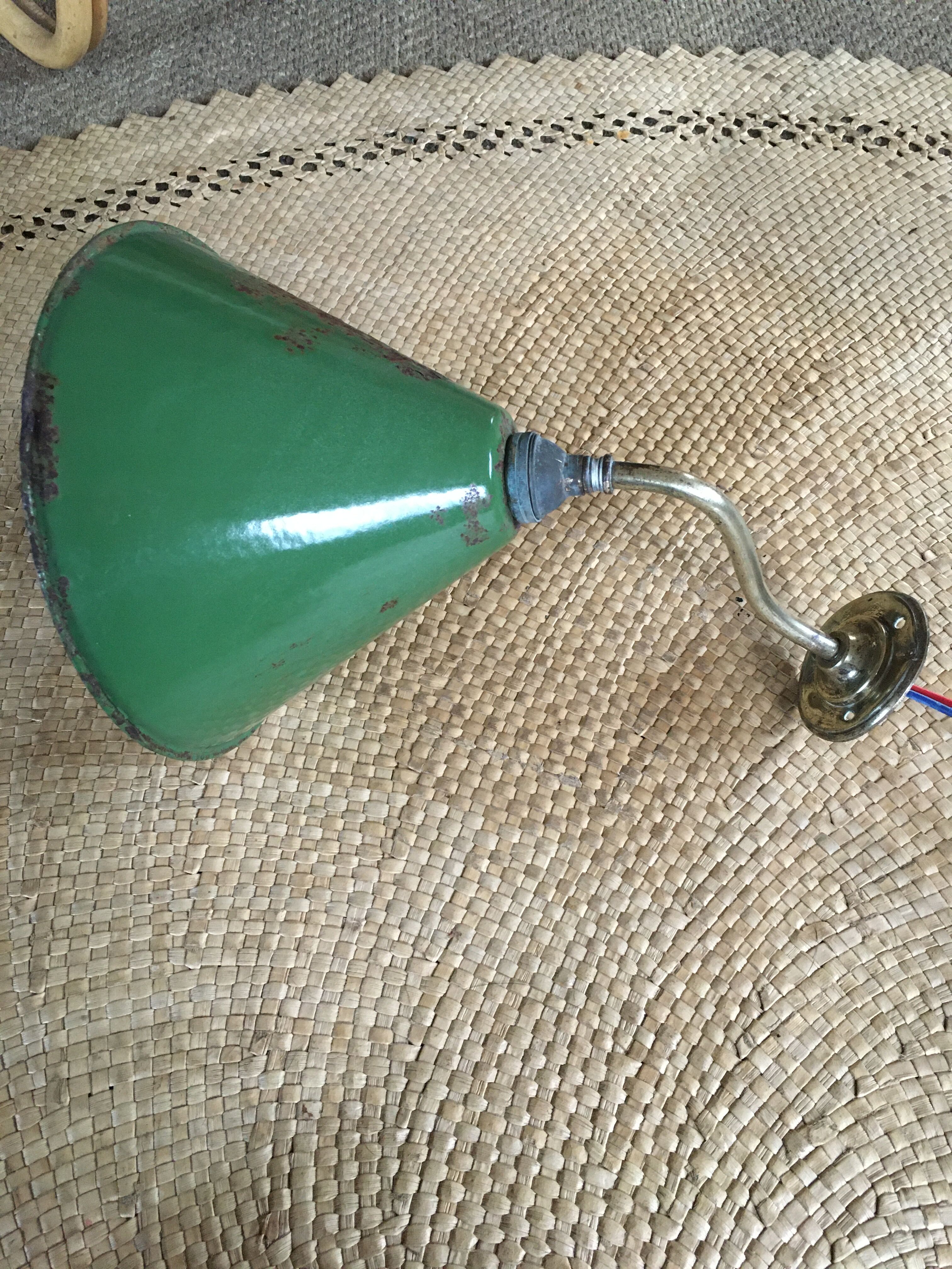 Enamelled sheet metal wall light