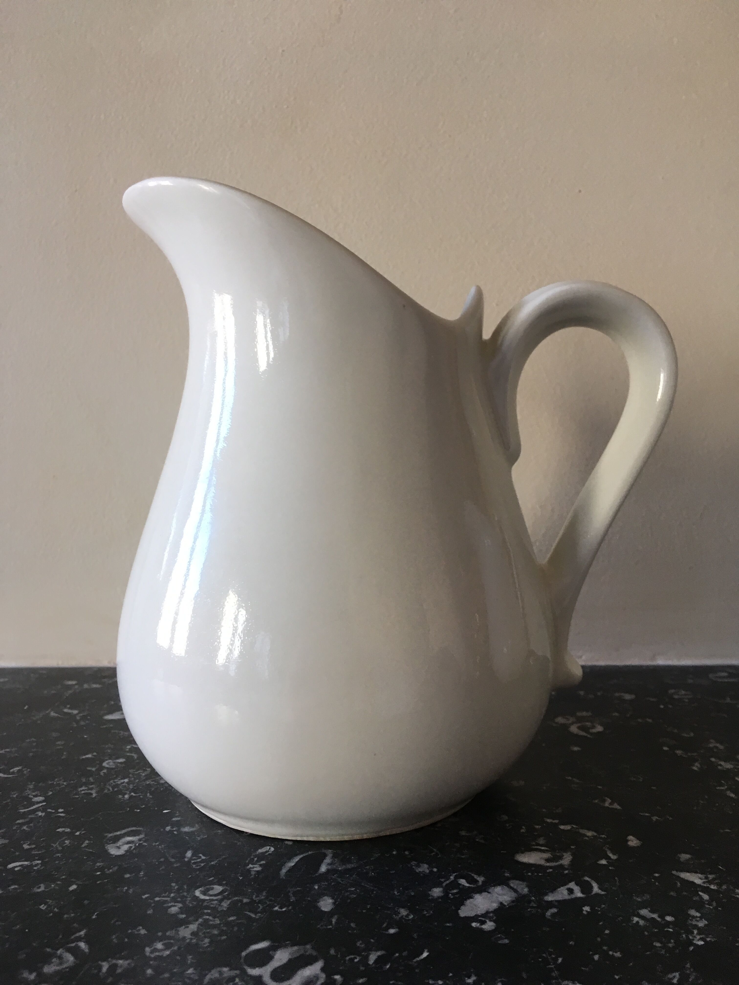 Broc in white fire porcelain with large spout