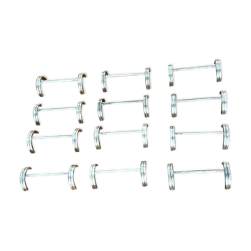 12 porte-couteaux en métal argenté Saint Hilaire modèle Arceaux en coffret