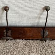 Old coat rack with metal/brass hooks