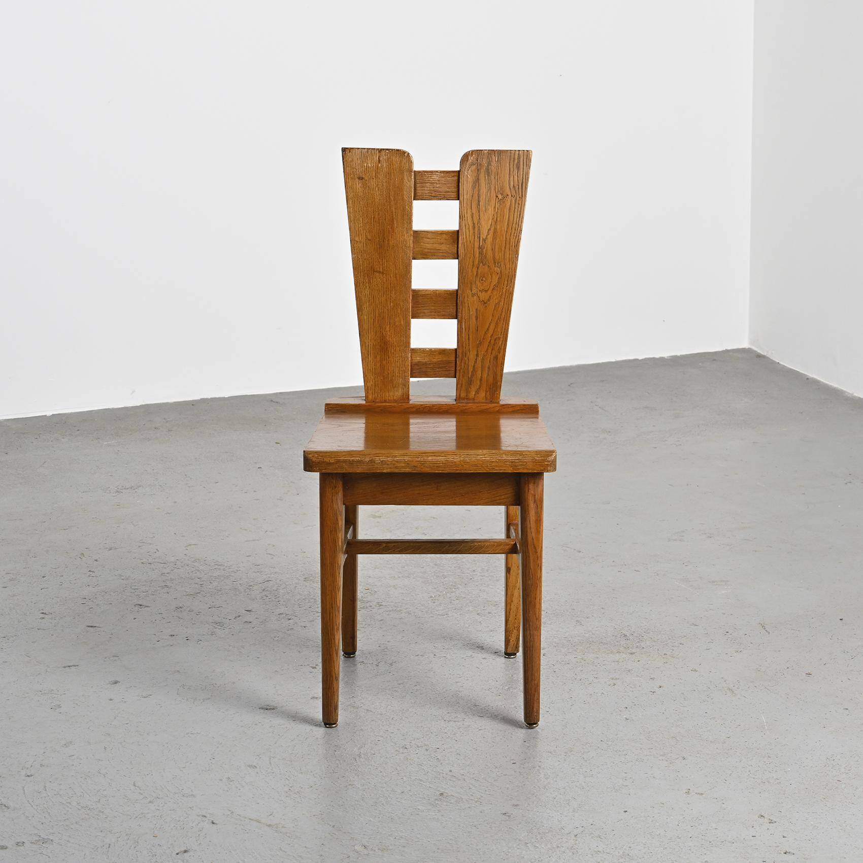 Set of six oak chairs by Henry Jacques Le Même, France circa 1940