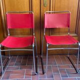 2 tubular chairs in red leather 1970