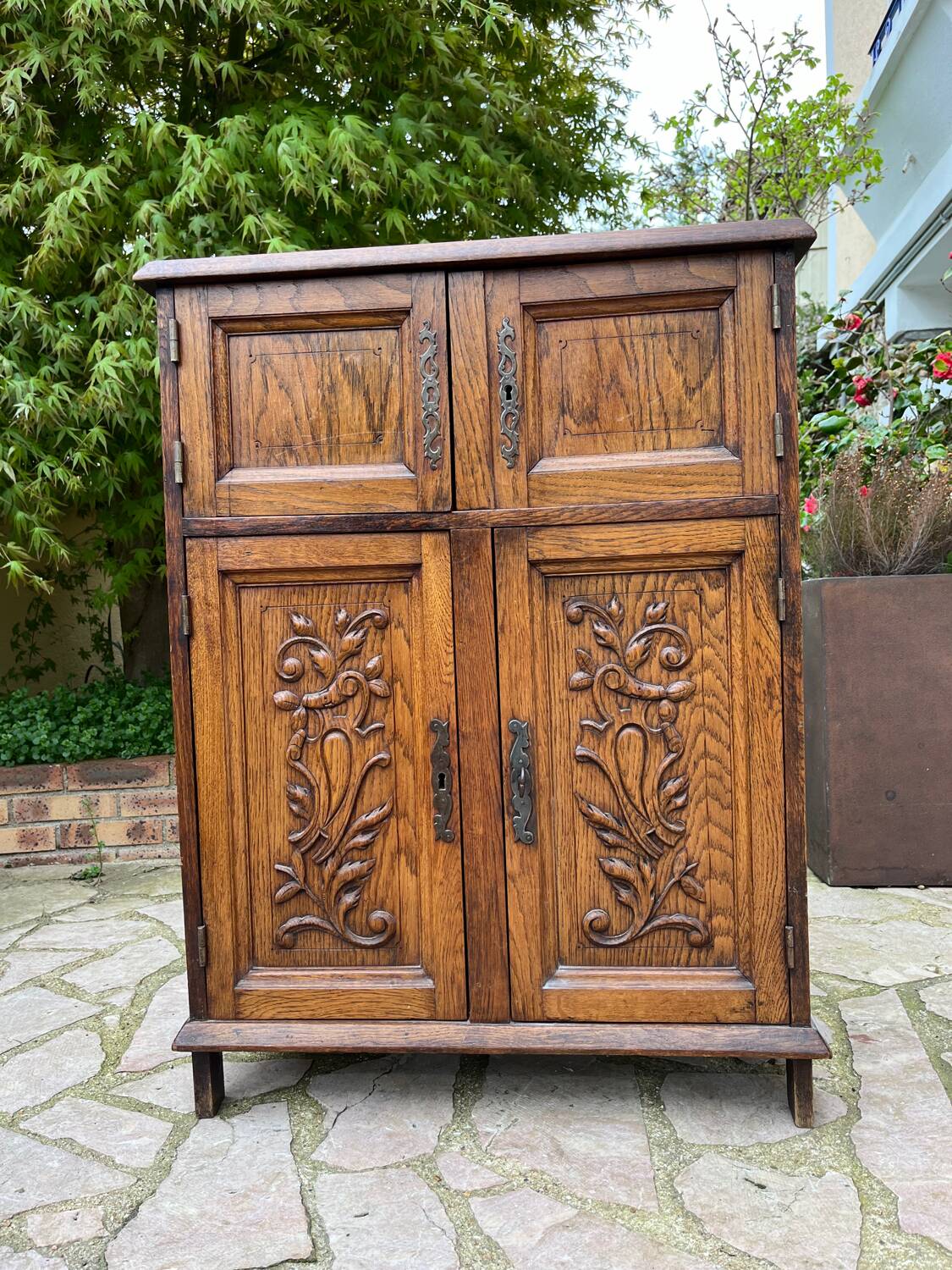 Low carved wooden sideboard