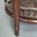 Vintage rattan coffee table with smoked glass top and rattan basket shelf