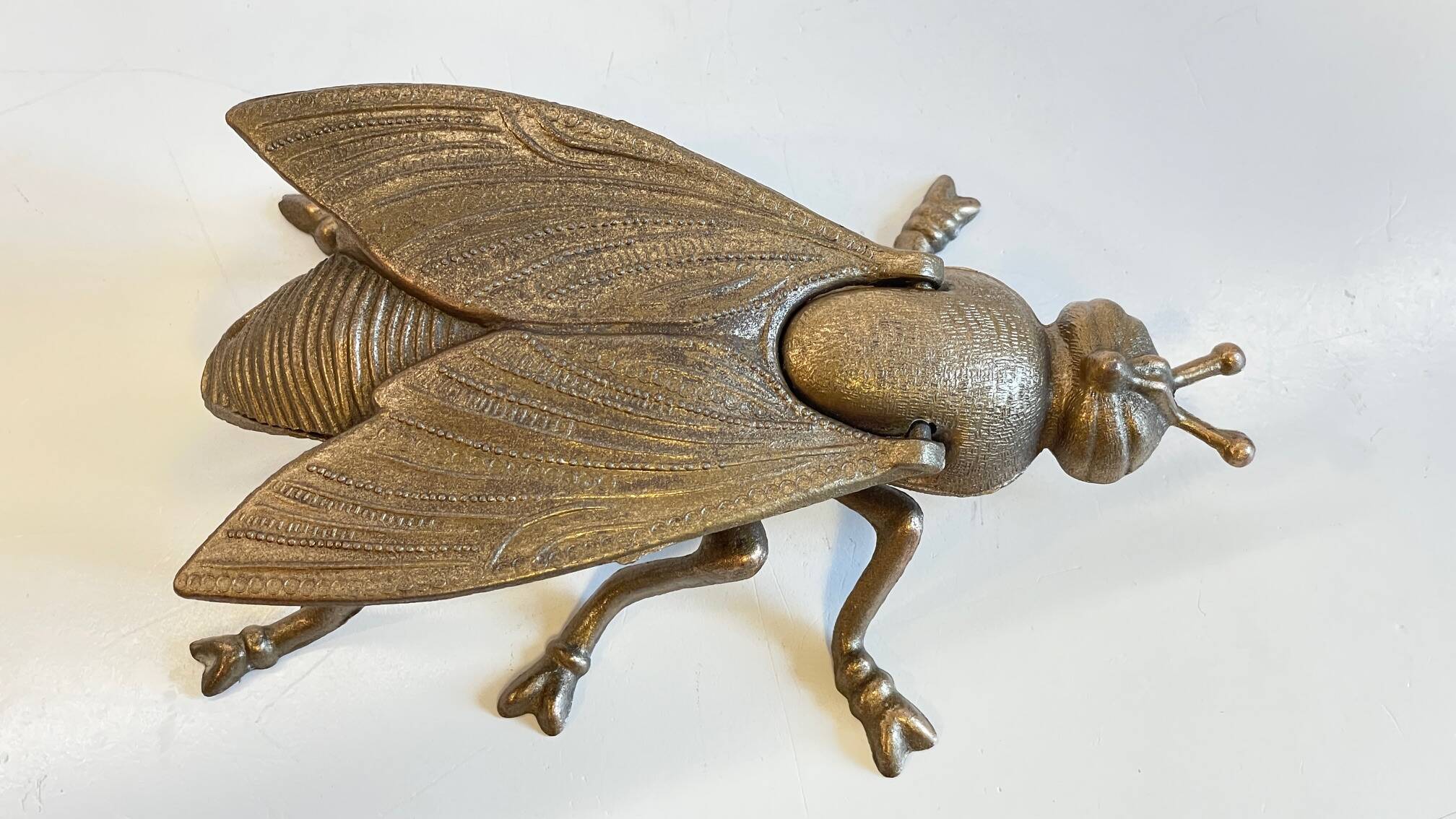 Vintage fly ashtray in patinated metal
