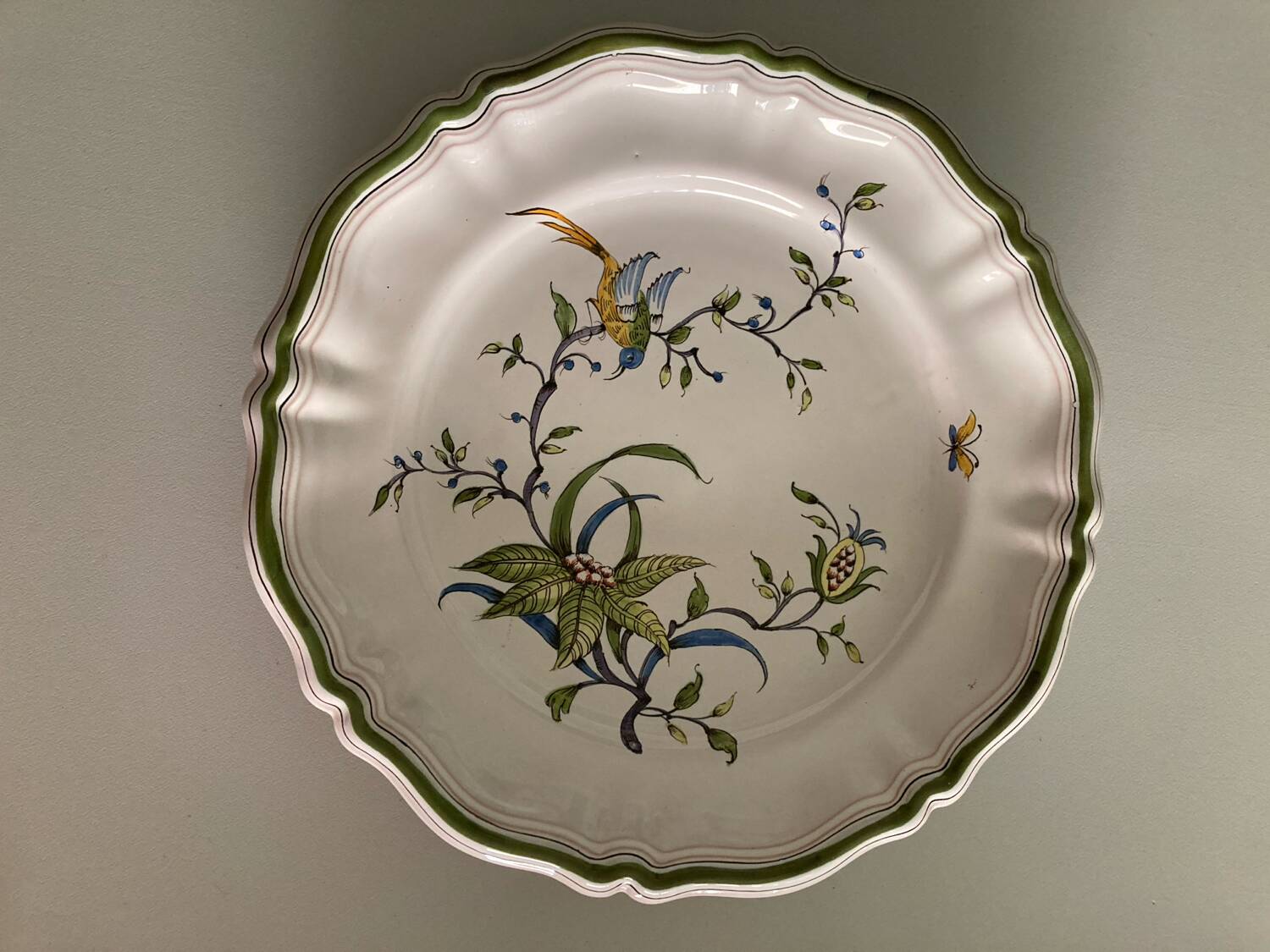 Moustiers porcelain plate with bird decor