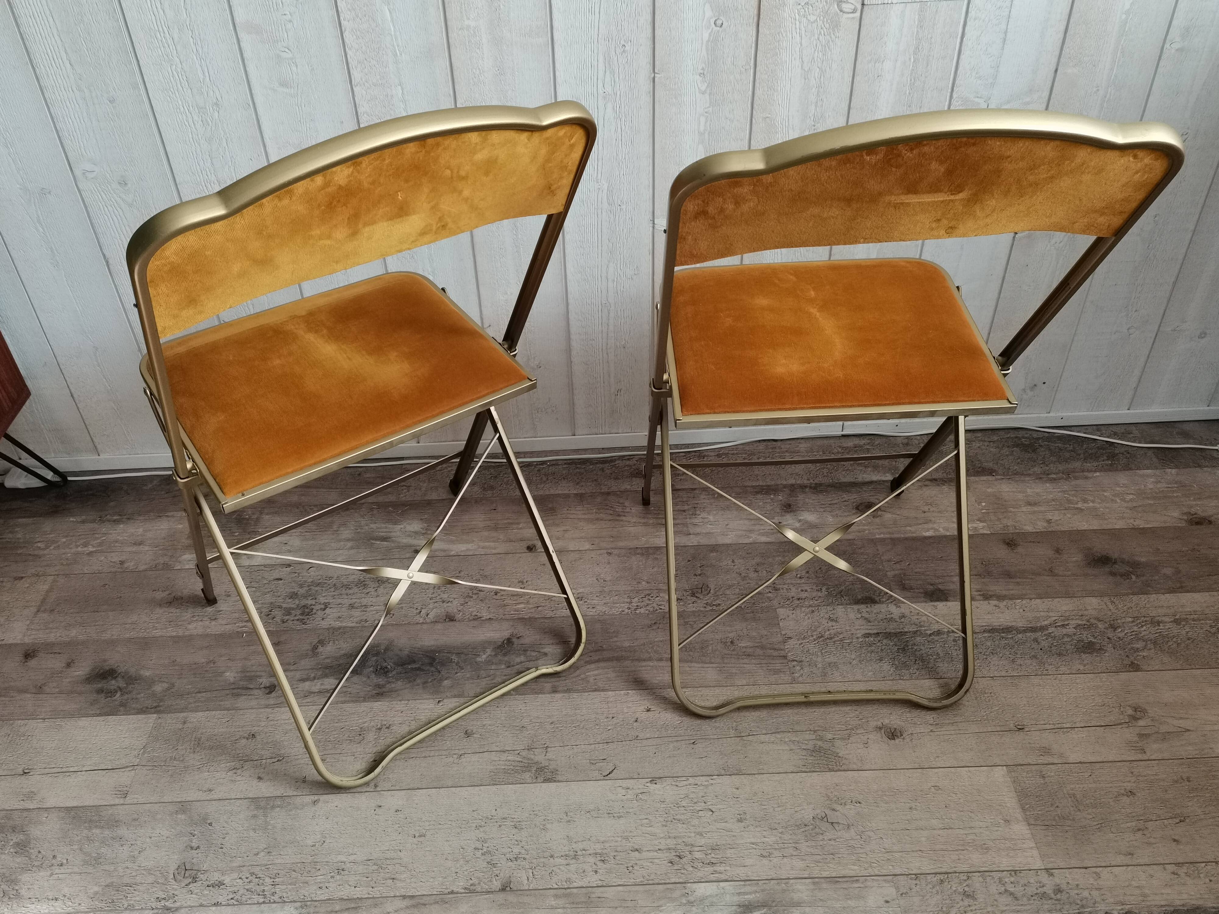 Two gold velvet chairs