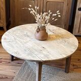 Antique round coffee table in raw solid wood