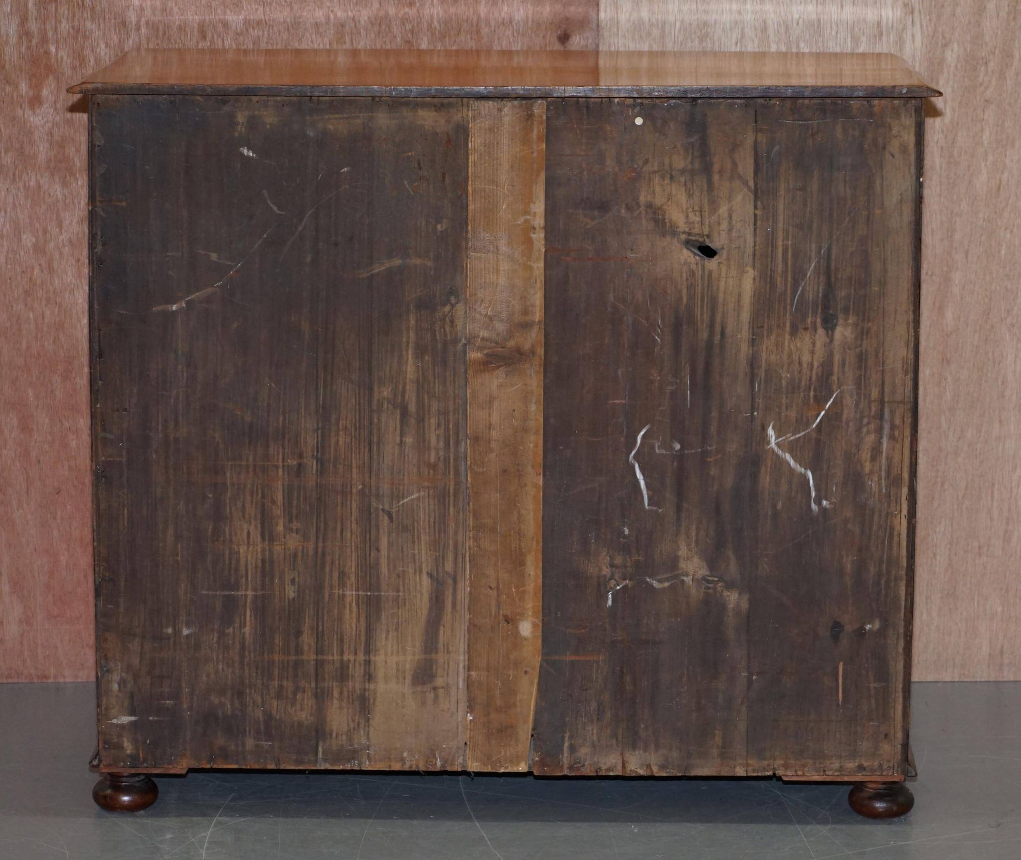 Victorian military commode in patinated walnut.