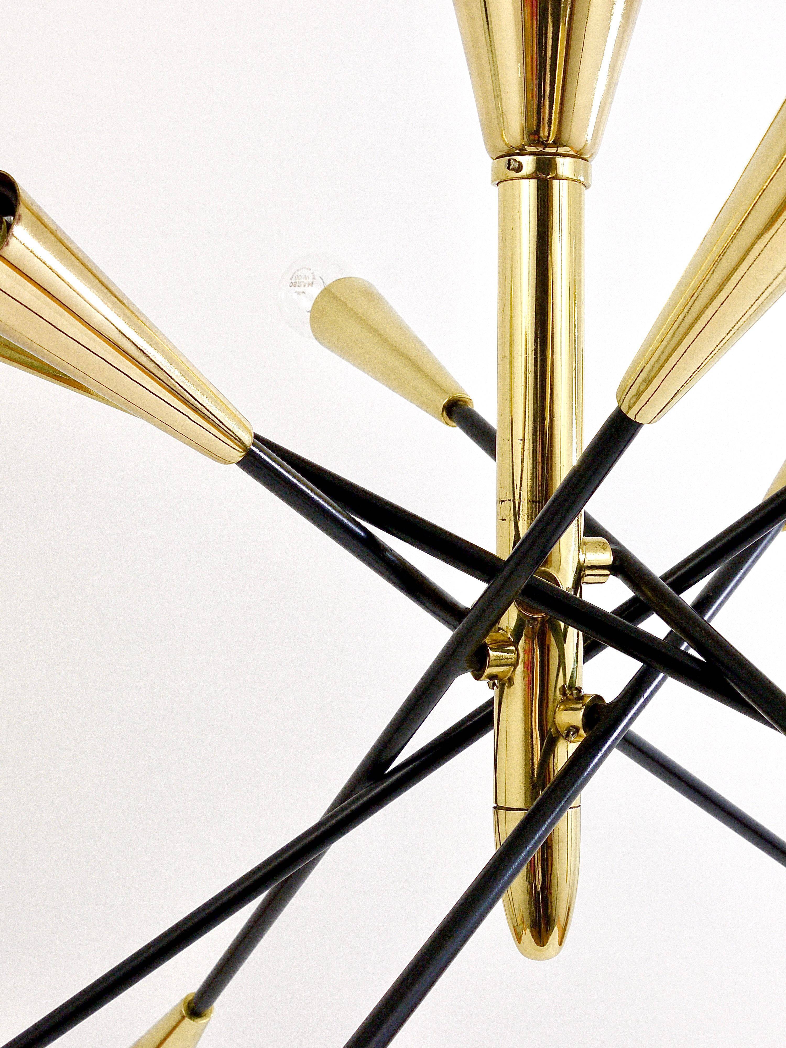 Black and brass articulated Sputnik chandelier in Stilnovo style, Italy, 1950.