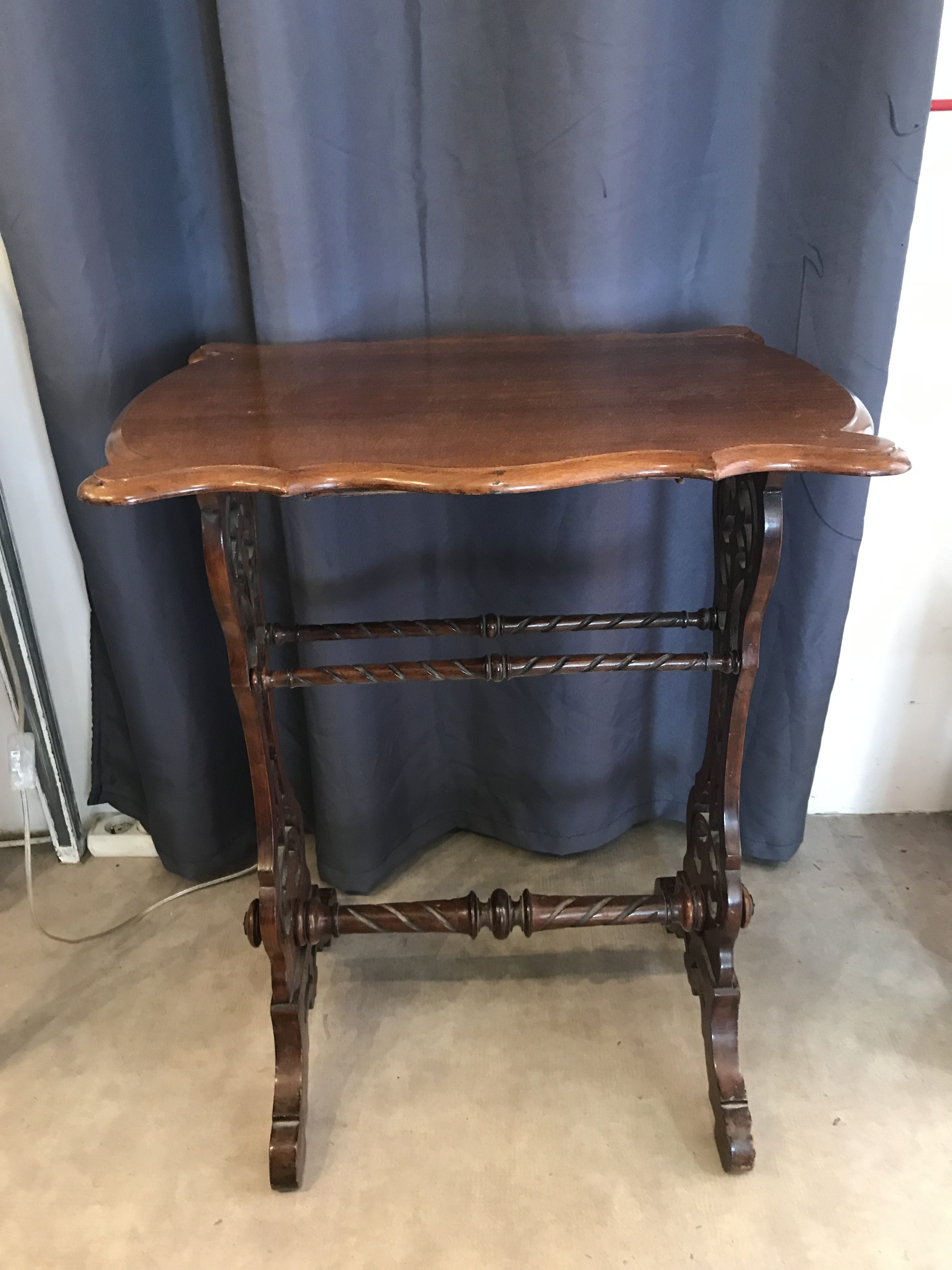 Art nouveau mahogany table with cut-out top
