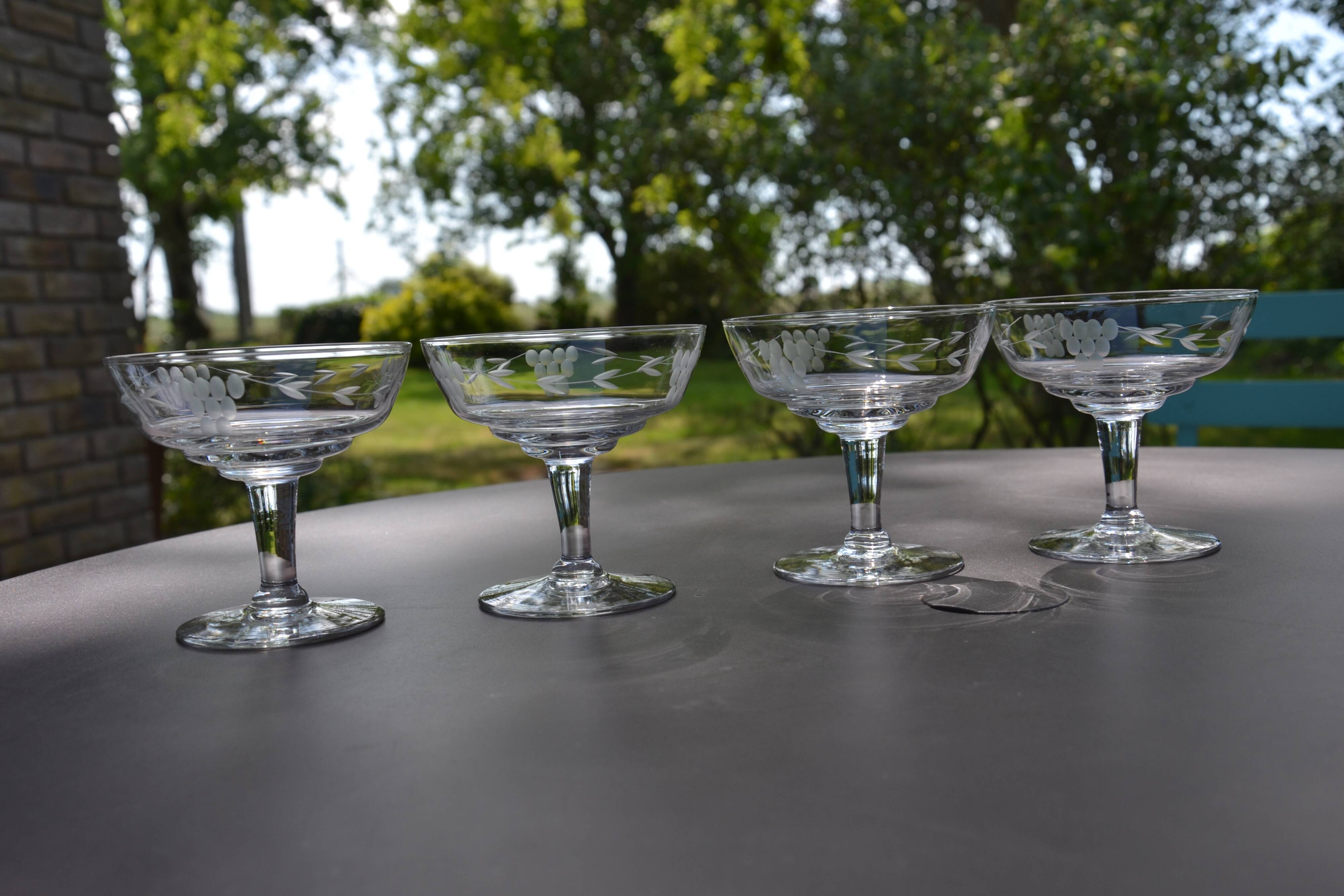 4 original antique champagne glasses in Belgian engraved glass