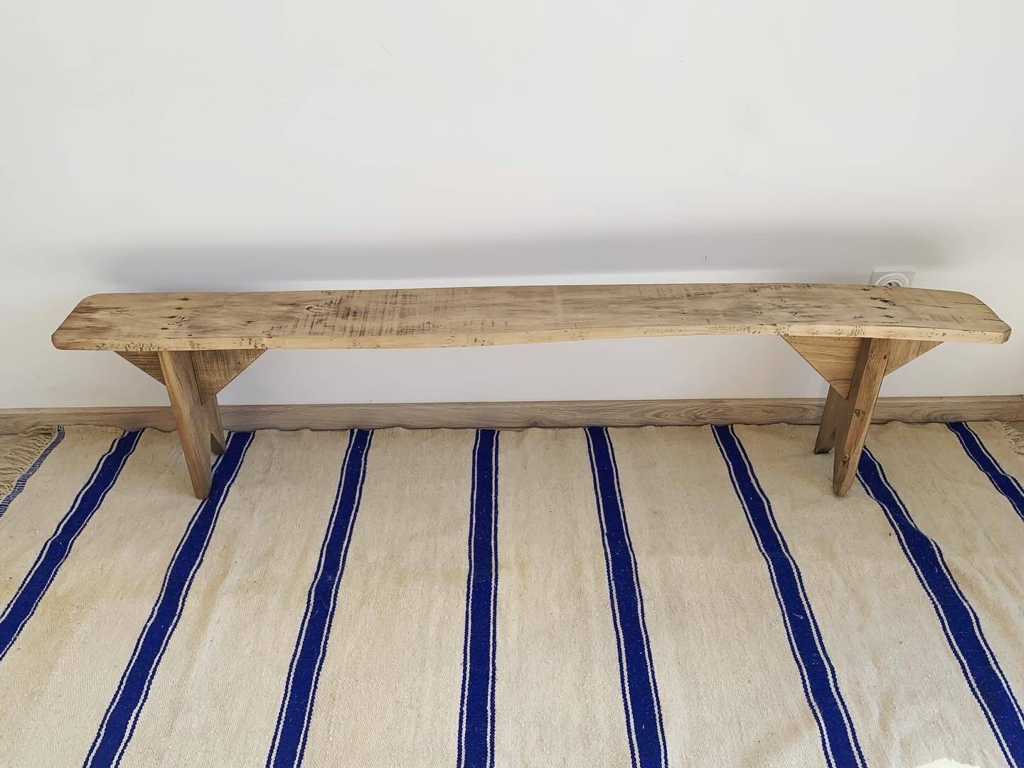 Old restored wooden farm bench