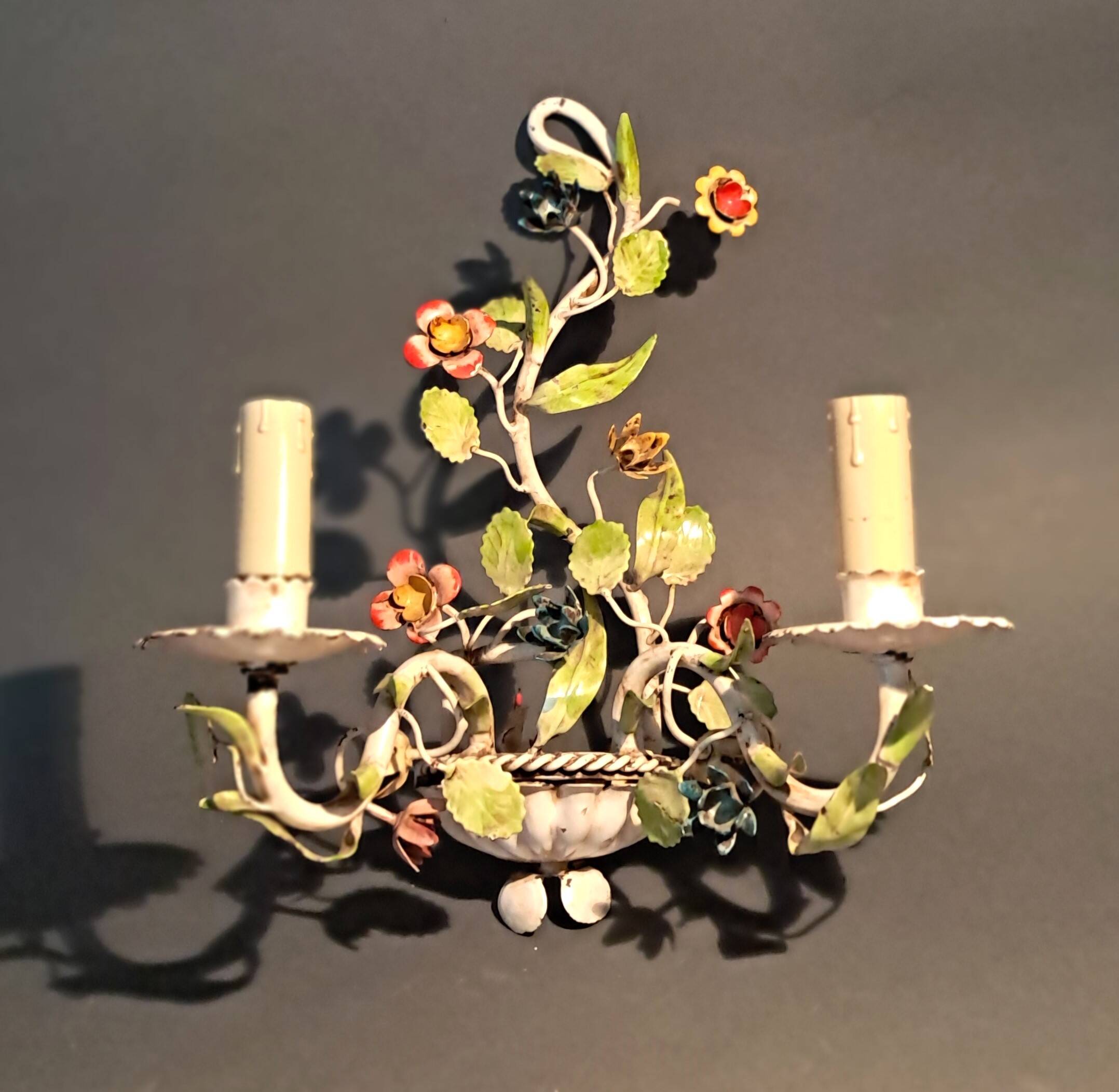 Two-light polychrome painted wrought iron wall lights, Italy 1950/1960.