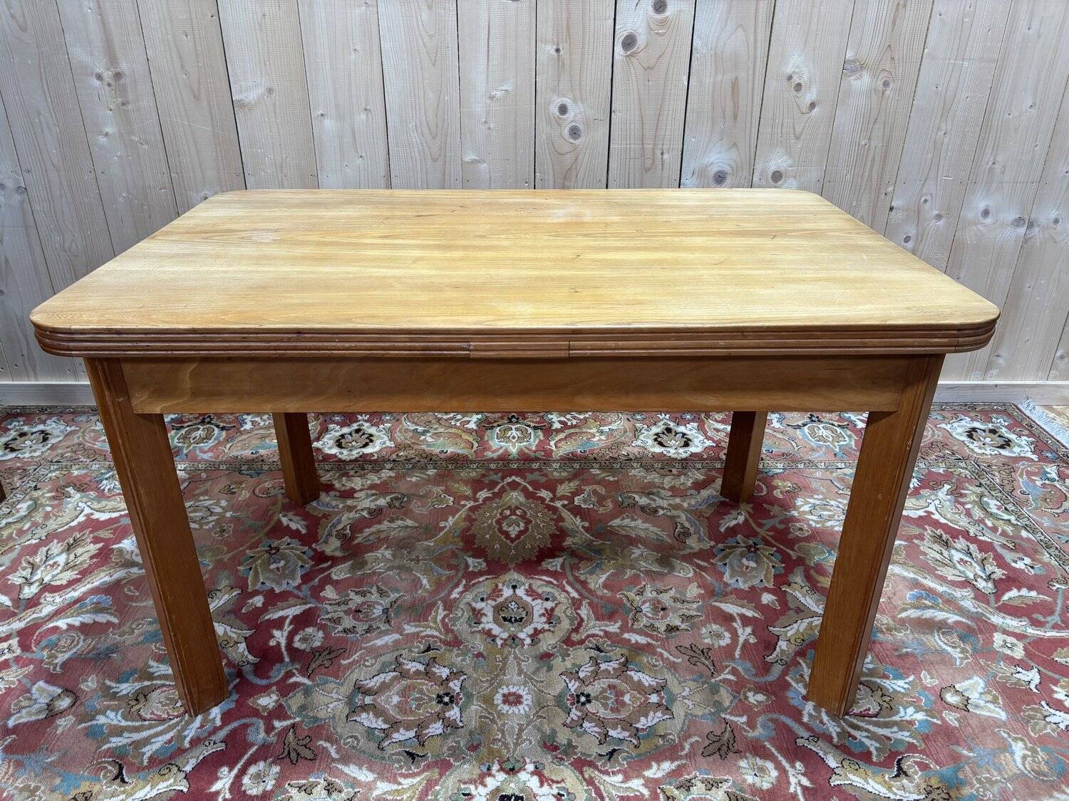 Table with extensions from the 1950s in elm.