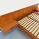 Double bed vintage Scandinavian in teak from the 1960s with integrated bedside tables.