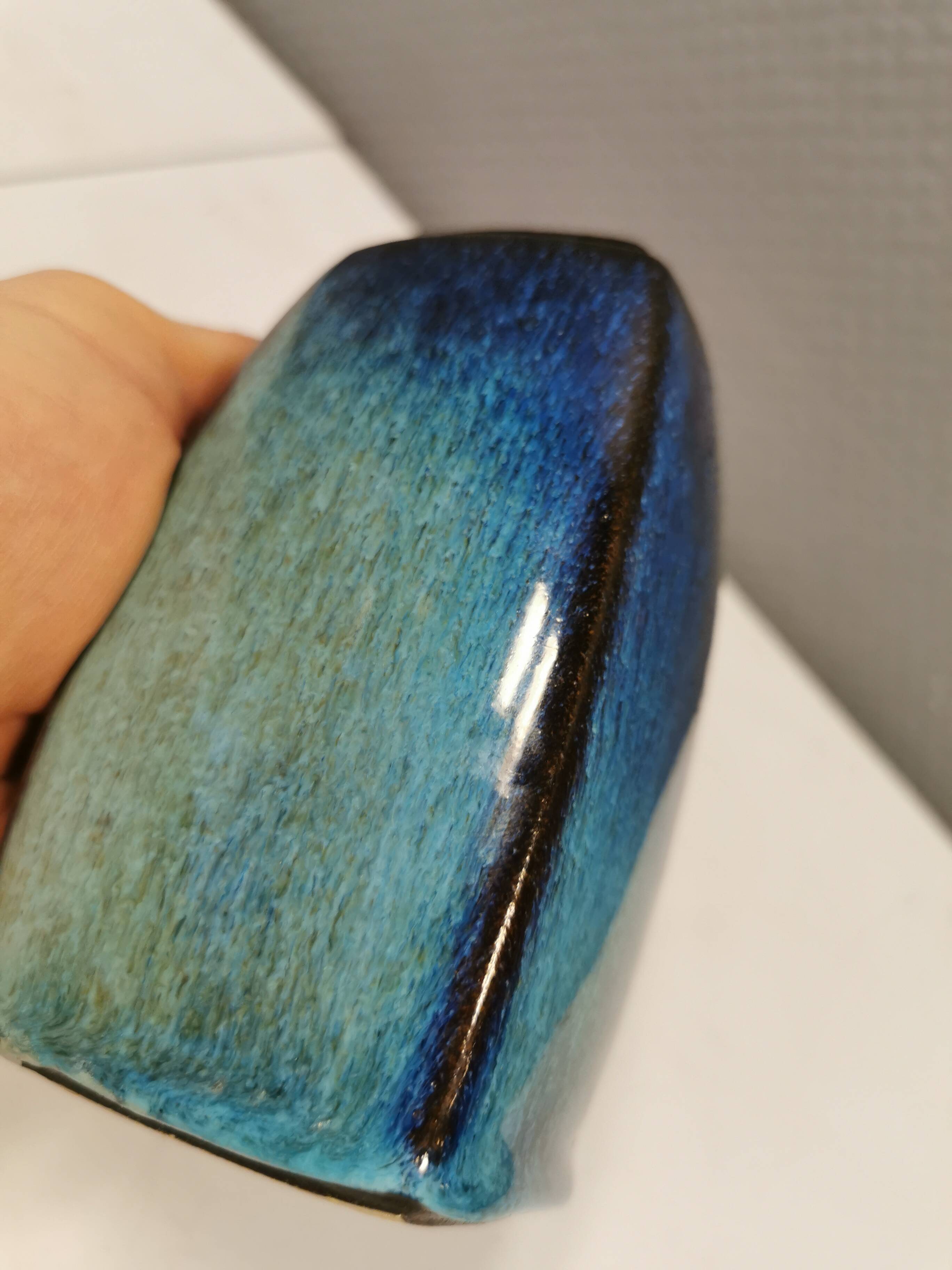 Vase in several shades of blue, from Danish Stogo art pottery. Estimated 1970-1980s