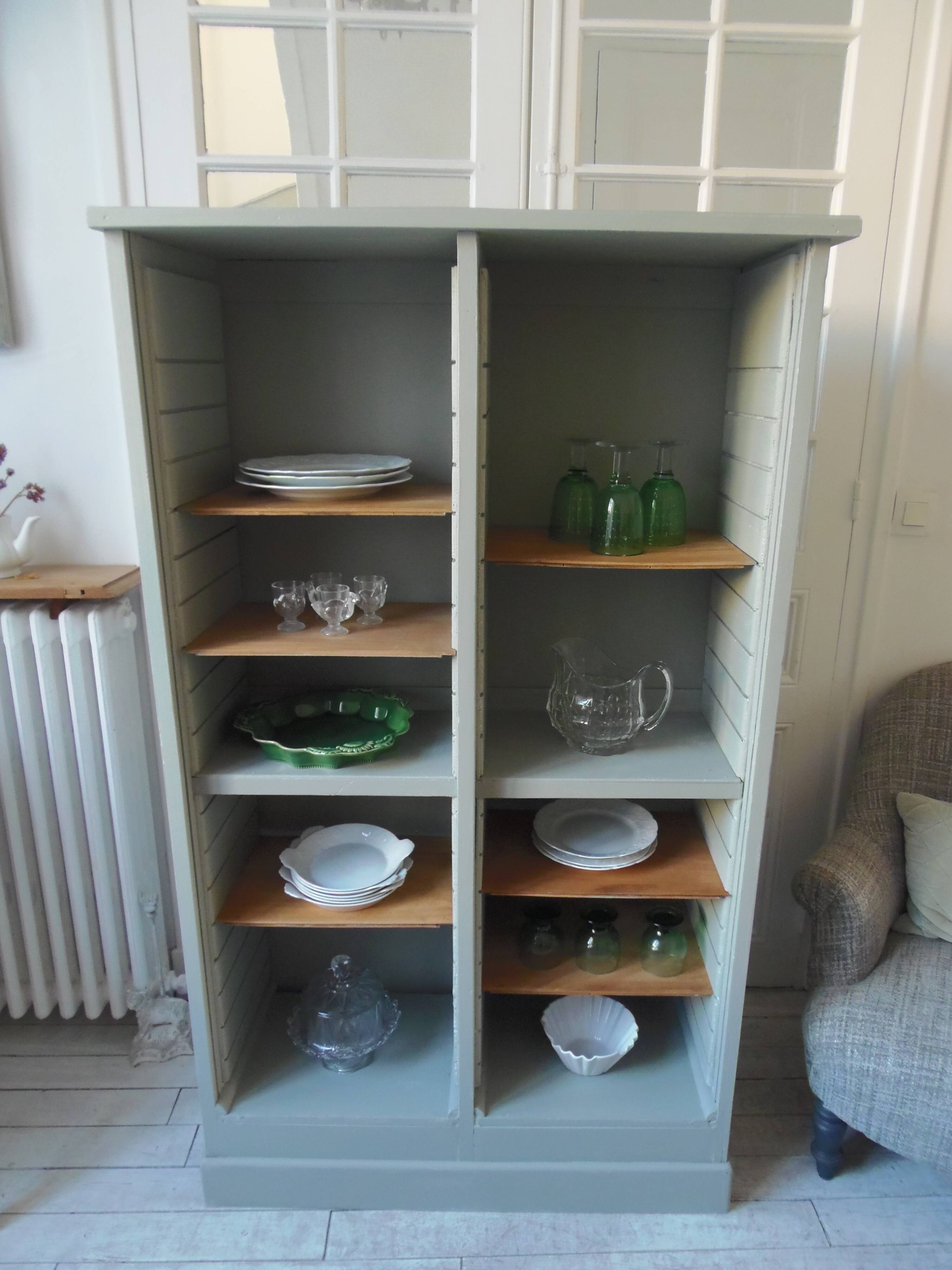 Vintage furniture transformed into a bookcase, verdigris patinated sideboard.