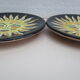 2 hand-decorated ceramic plates