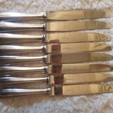 Set of 8 silver metal knives